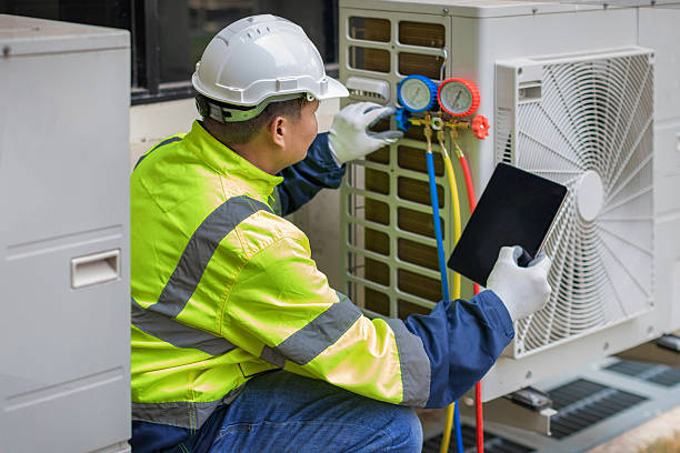 Professional Ductwork Repair technician working in Wood River, IL
